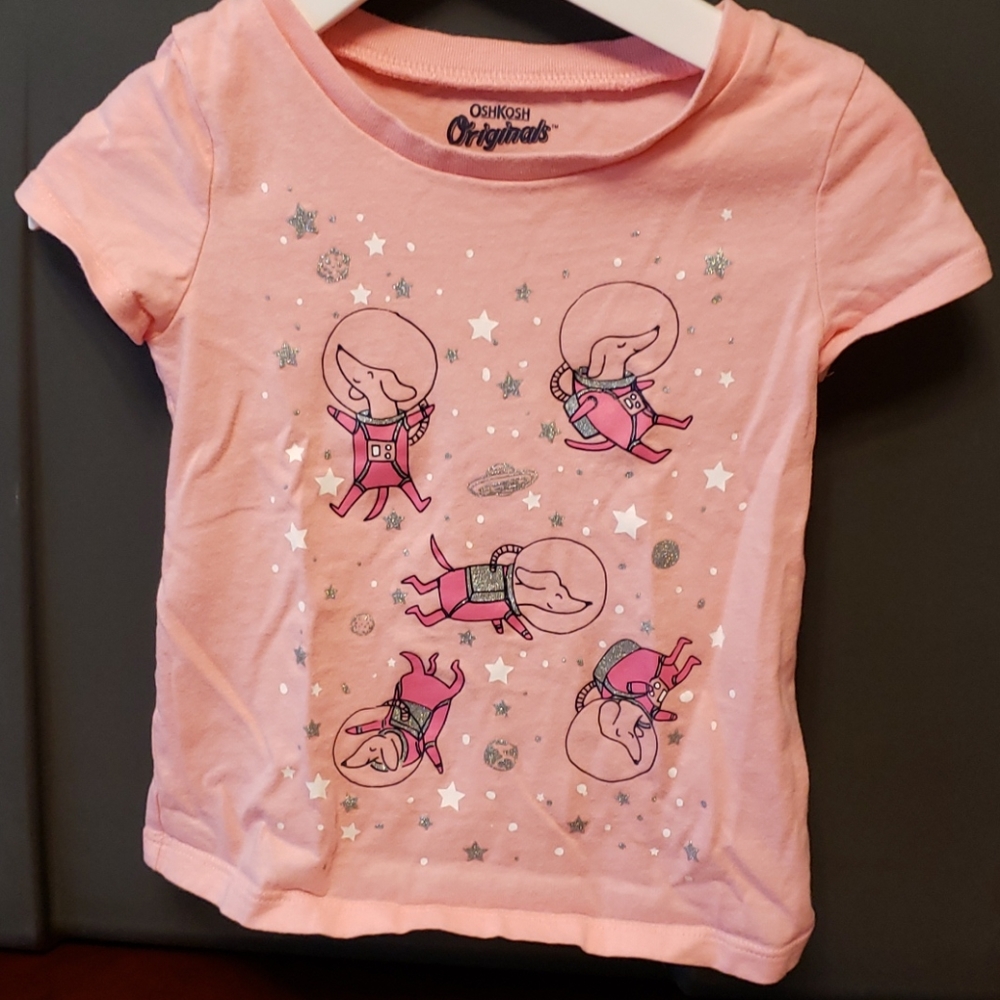 Girl's shirt. Dogs in space.